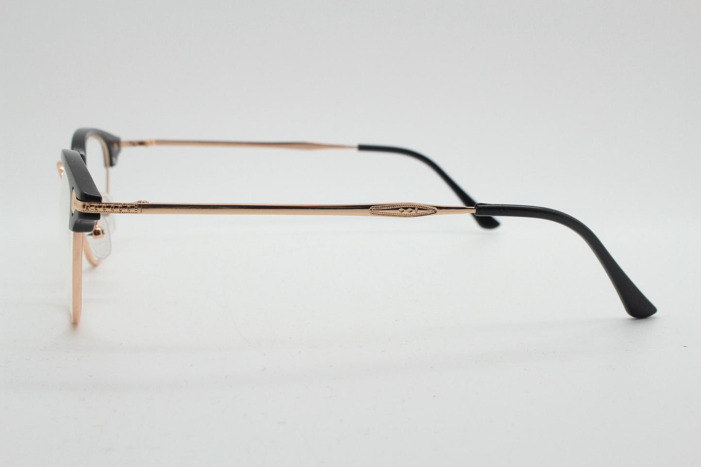 90s vintage browline cat eye glasses. Black gloss and gold half frame eyeglasses. 50s, 60s cateye design with clear lenses. NOS