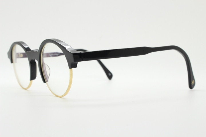 Kaleos round half frame eye glasses. Black gloss acetate browline optical frames with gold underwire. Prescription eyeglasses. RX