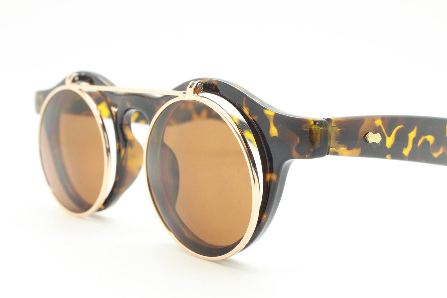 Vintage 90s round flipper sunglasses. 30s style tortoise frame with clear lenses and flip up sunglasses visor. BNWT unused