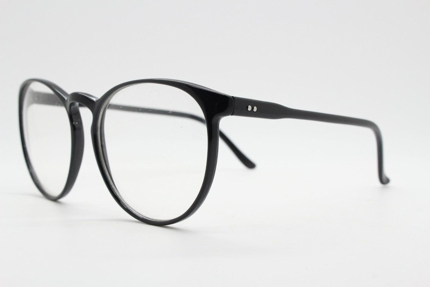 80s vintage black round glasses. Slightly oversized slim optical frames. Prescription eyeglasses with clear lens. RX spectacles