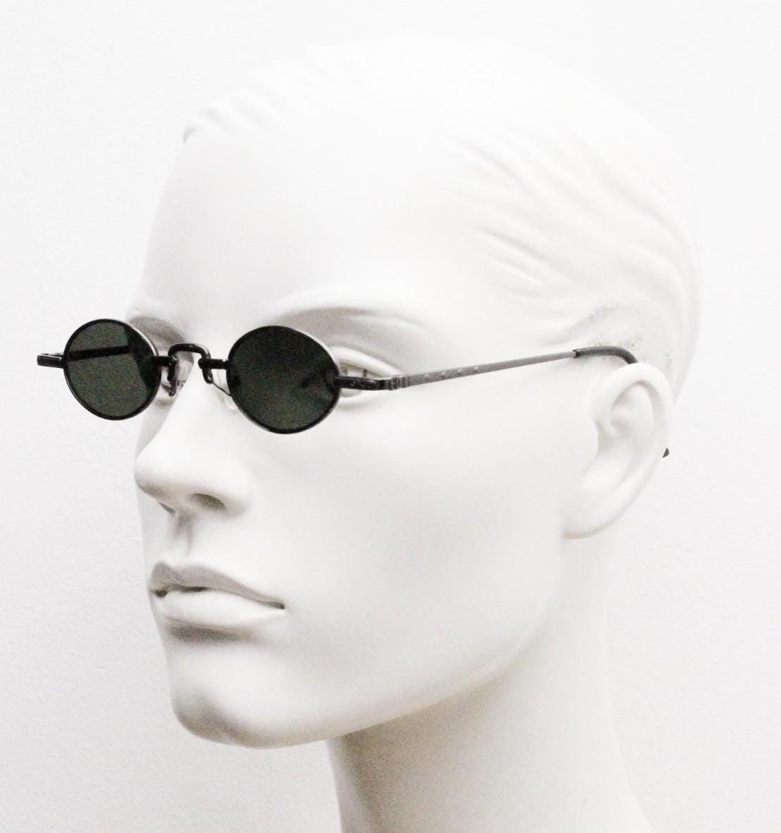 90s vintage small oval sunglasses. Imposing minimal grey metal victorian style frame with green lenses. Steampunk. Micro. Unused NOS