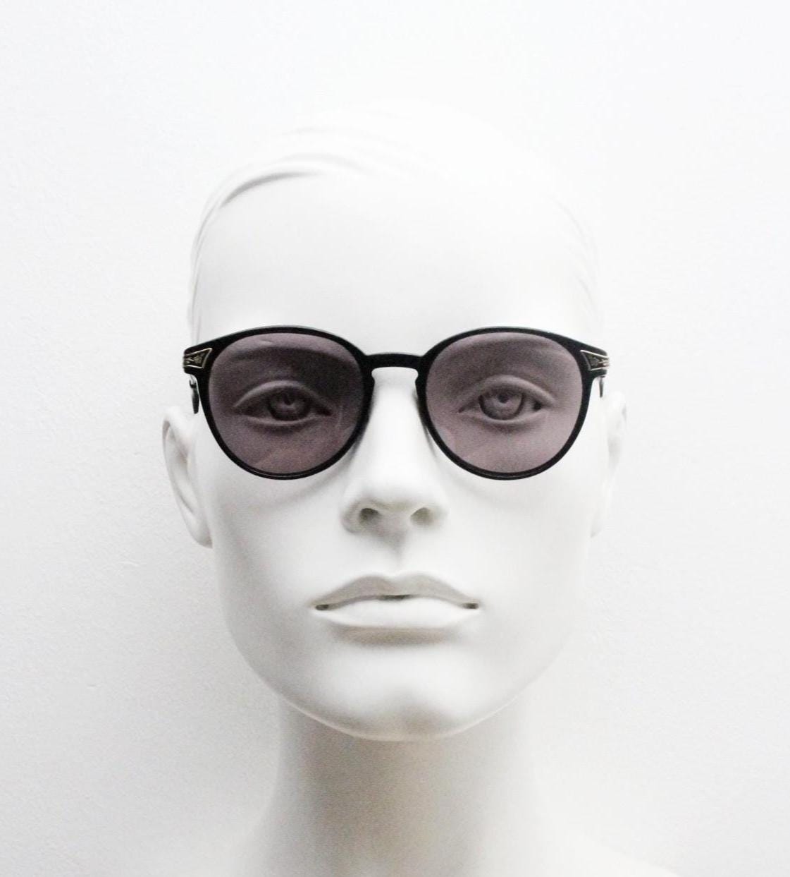 Laura Ashley 90s vintage round sunglasses. Refined 1940s design in black acetate with ornate embossed metal arm details. Unused NOS