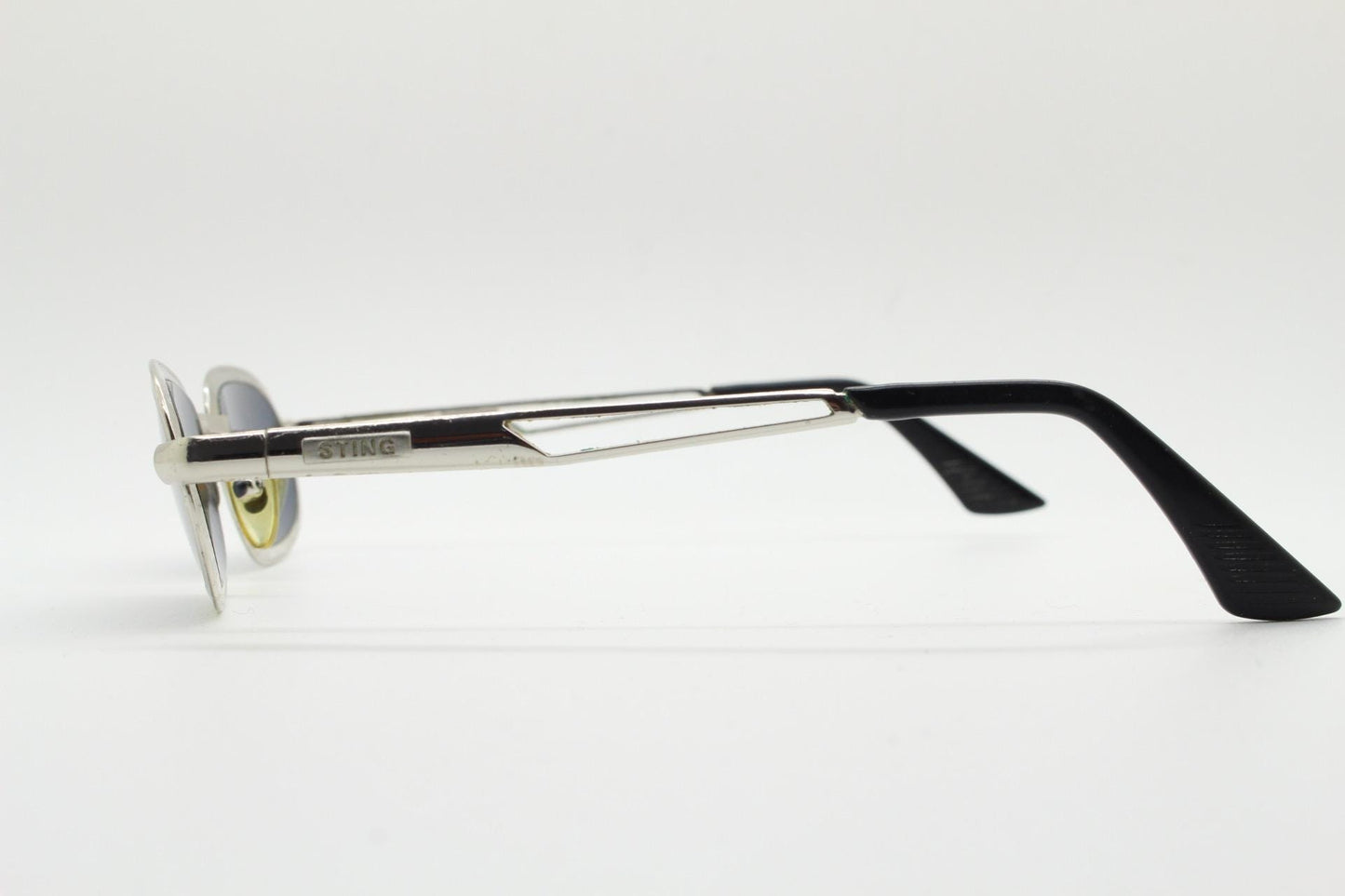 Sting 90s vintage oval sunglasses. Minimal 'Industrial tech' style in slightly small proportions that's quirky but in a quality finish