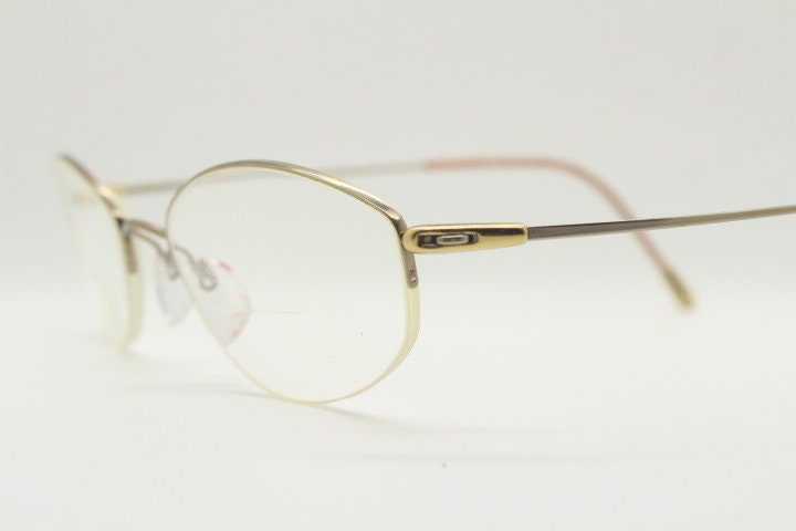 Silhouette oval half frame eye glasses model 6608 made in Austria. Minimal optical frame with extremely flexible wire arms. Prescription RX