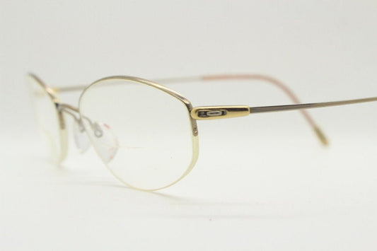Silhouette oval half frame eye glasses model 6608 made in Austria. Minimal optical frame with extremely flexible wire arms. Prescription RX