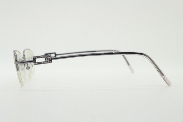 Gucci rectangular eye glasses made in Italy. Slim metal wire low profile optical half frame with diamante logo. Prescription eyeglasses. RX