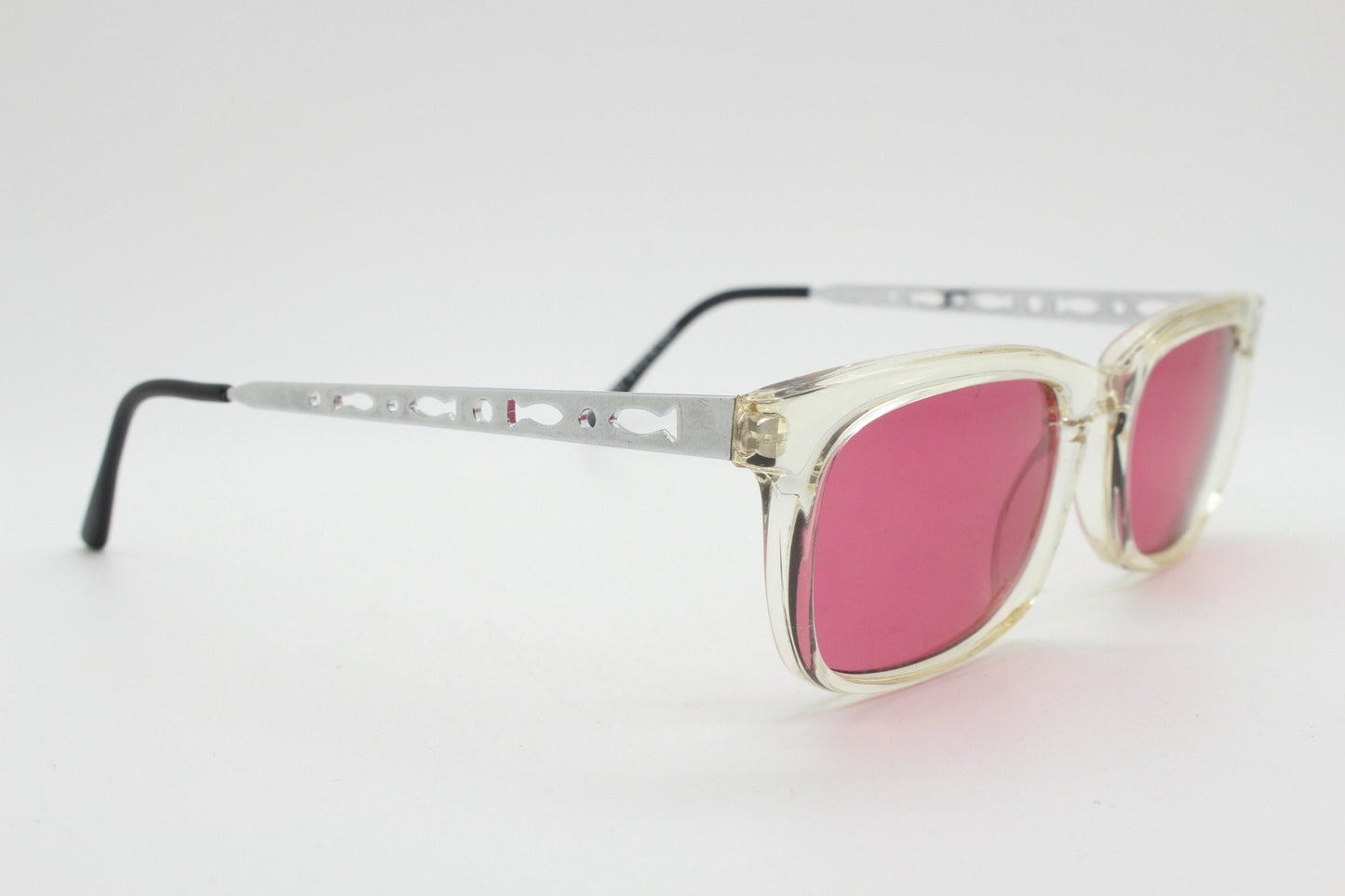 90s vintage futuristic crystal  sunglasses. Rectangular transparent frame with extraordinary arm cut outs and shocking pink lenses. NOS