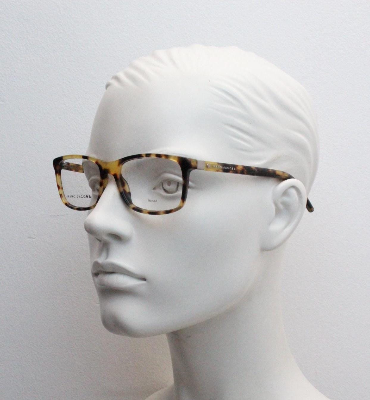 Marc Jacobs rectangular low profile eye glasses. Vibrant honey tortoise gloss acetate optical frames. Prescription eyeglasses. BNWT