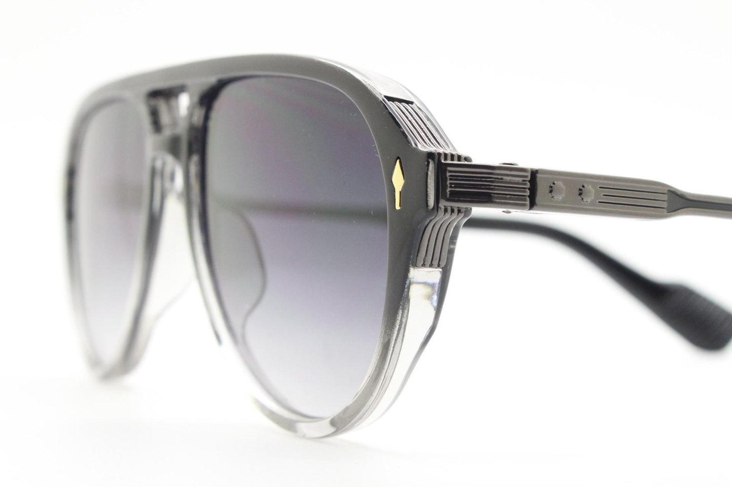 Y2K vintage transparent black aviator sunglasses. Well proportioned teardrop shape with graduating lenses and grey metal embossed arms. NOS