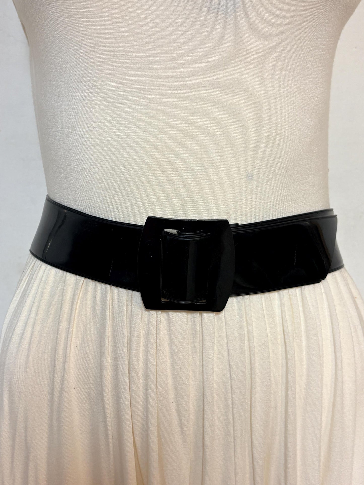 80s vintage womens shiny fetish 2" dress belt. All black seamless vinyl with well matched flat buckle. 50s kinky pin up bad girl
