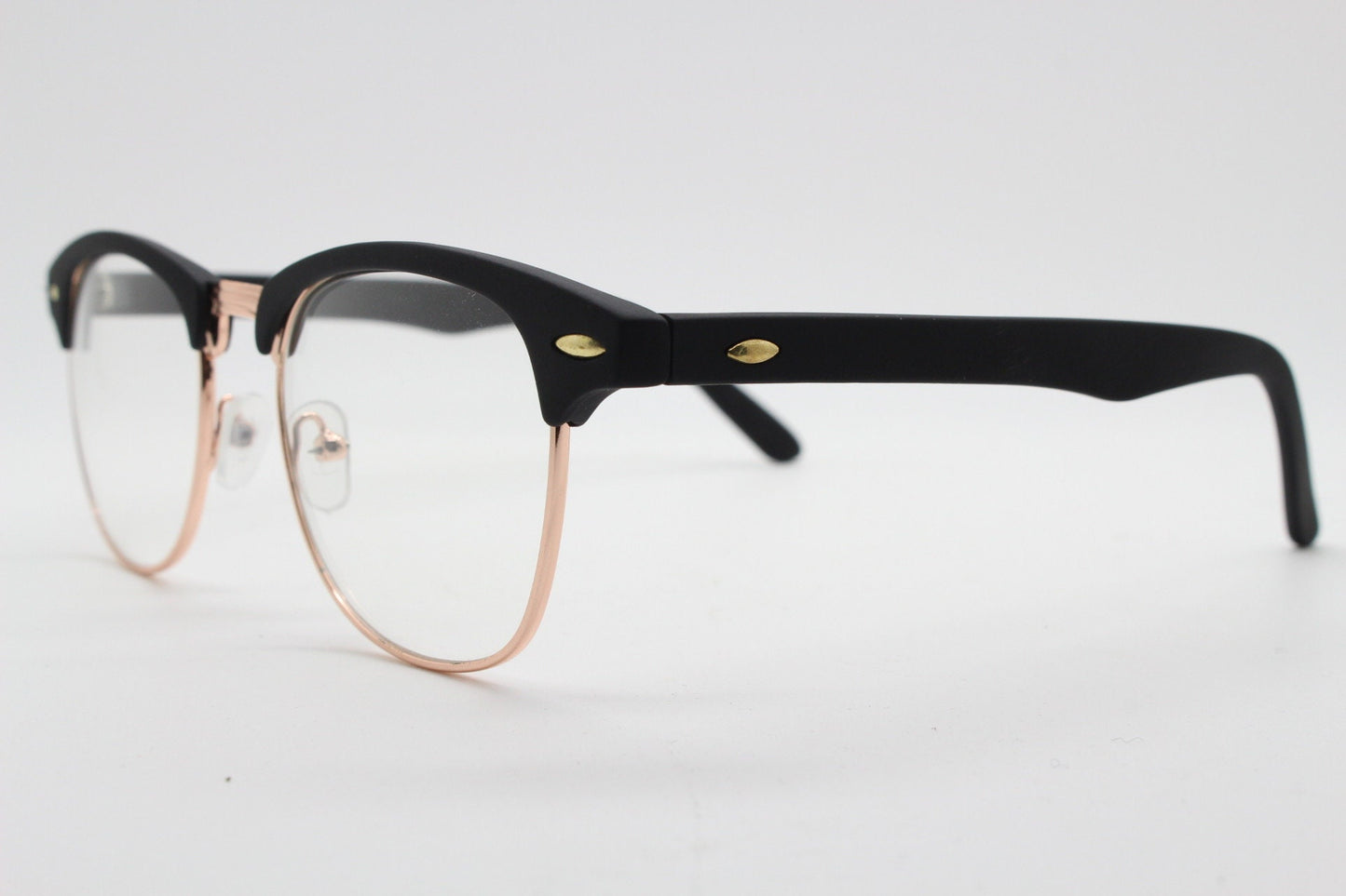 90s vintage browline sunglasses. All time classic design in black gloss finish with gold half rim. 50s, 60s. Unused NOS