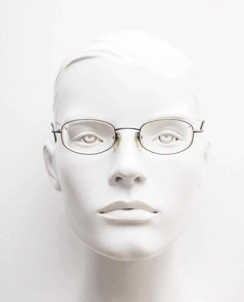 Giorgio Armani 90s vintage angular oval eye glasses made in Italy. Minimal grey chrome metal optical frame. Prescription RX spectacles