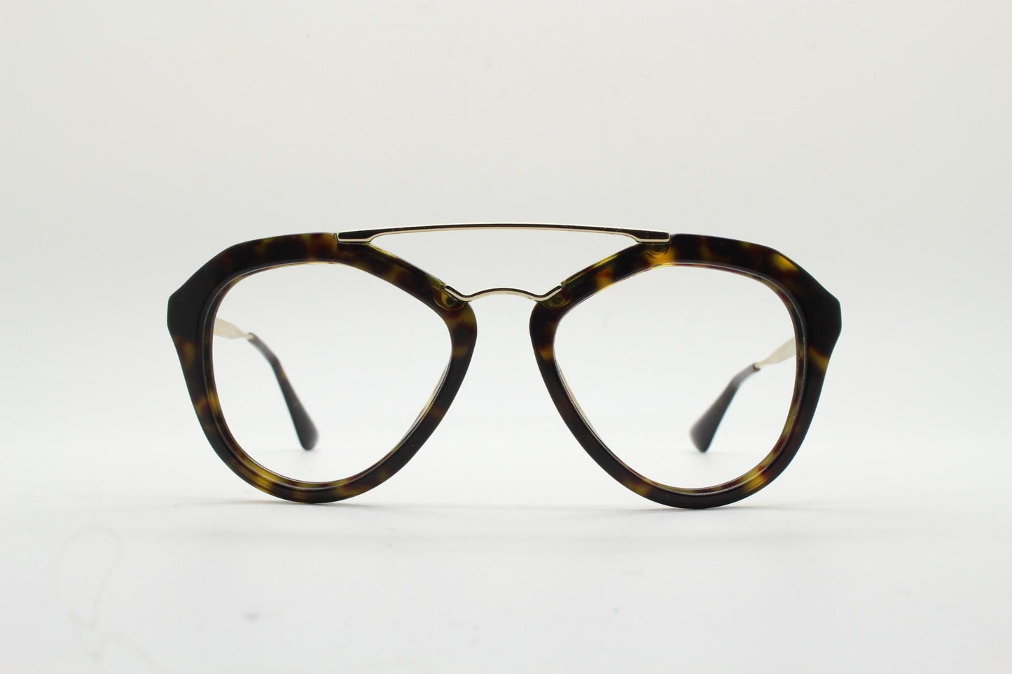 Prada angular eye glasses made in Italy. Thick tortoise acetate optical frames with prominent gold double bridge. Prescription. RX