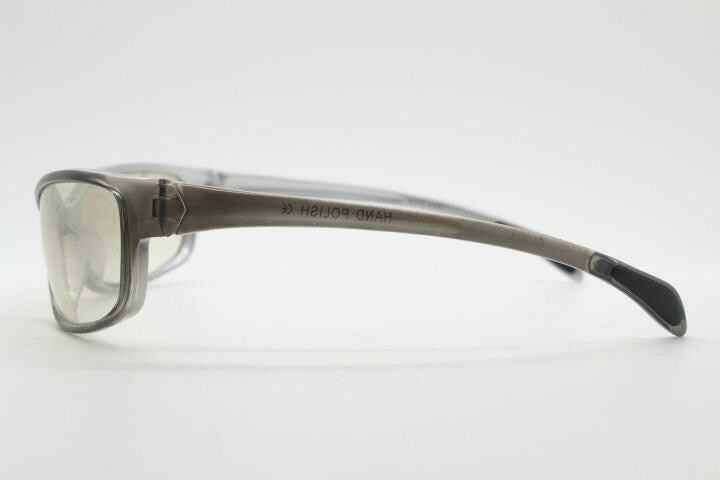Y2K vintage futuristic sunglasses. Gloss white and grey wrap around shield style frame with light tone lenses. Cosplay visor. 2000s NOS