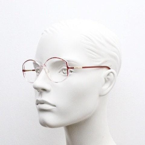 Silhouette 80s vintage hexagon eye glasses made in Austria. Transparent crystal optical frame with abstract red pattern. Prescription RX