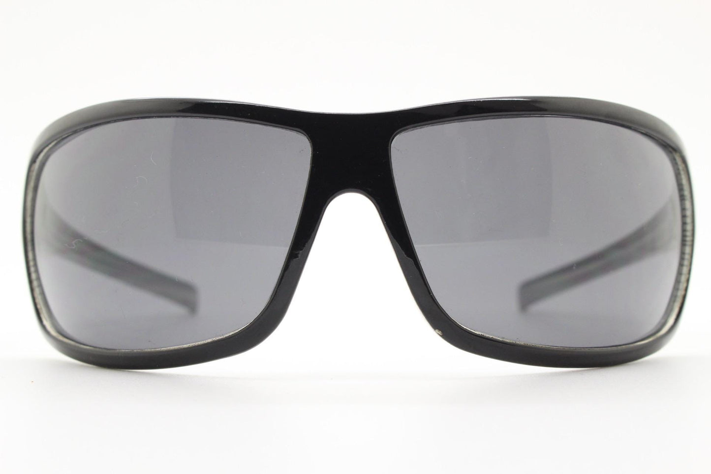 Y2k vintage wrap around large square sunglasses. Curved black shield frame with tasteful striped interior. 1960s bug eye design. 2000's NOS