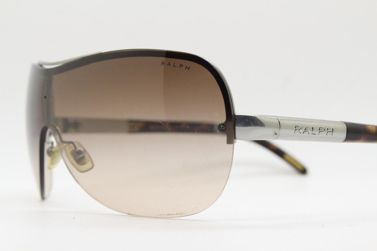 Ralph by Ralph Lauren Y2K vintage big shield sunglasses. 2000's curved wraparound mini mask with graduating mono lens. Aviator