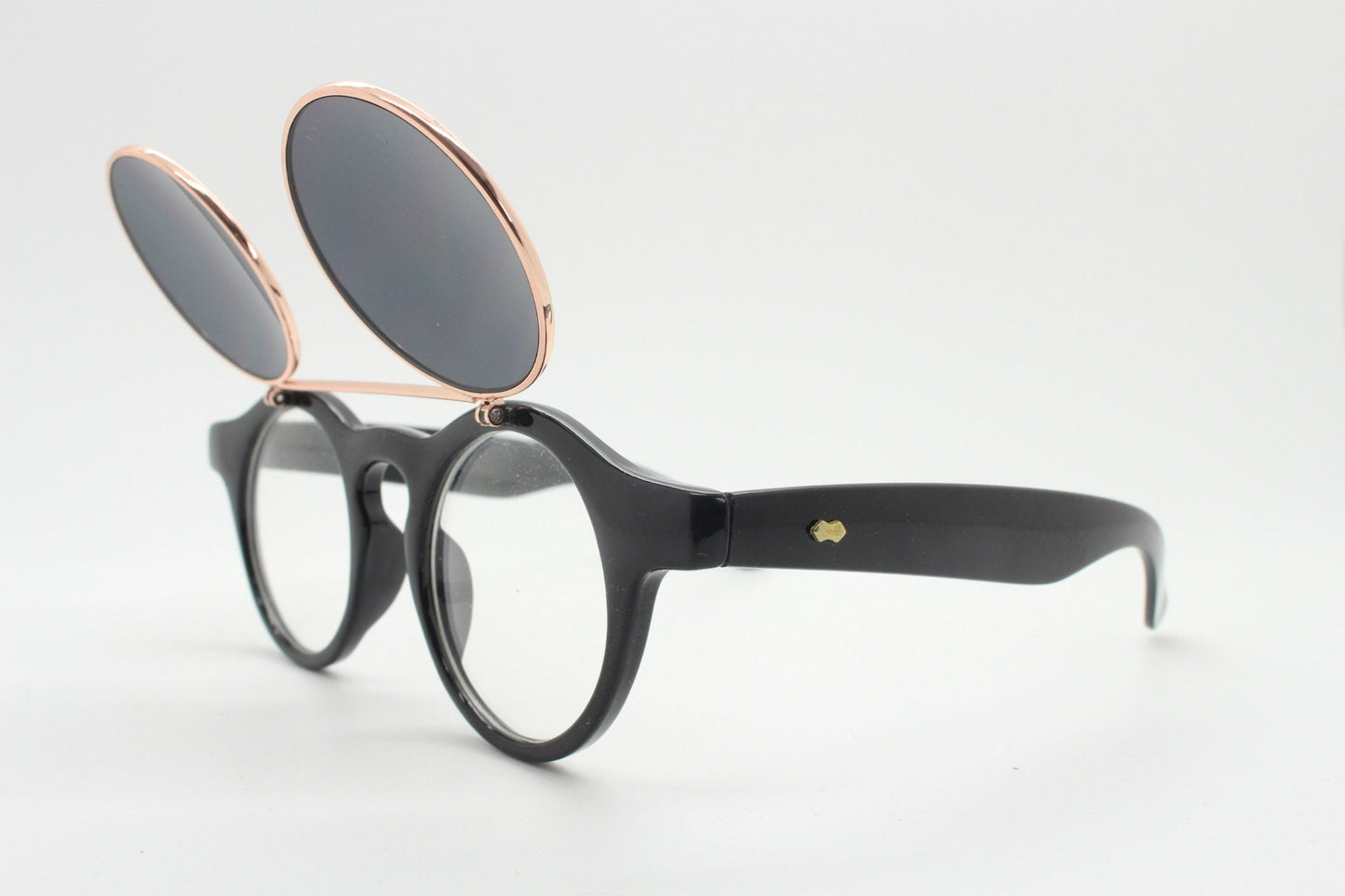 Vintage 90s round flipper sunglasses. 30s style black frame with clear lenses and flip up sunglasses visor. BNWT unused