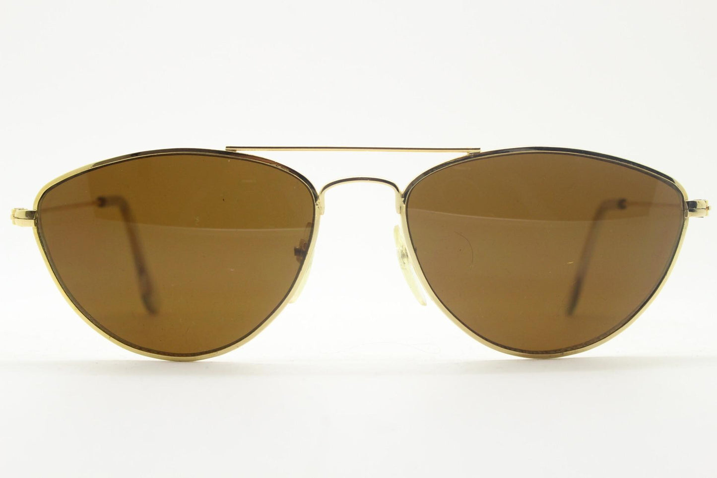 90s vintage minimal triangular sunglasses. Slim gold frame with plain brown lenses. Small modified aviator design. NOS
