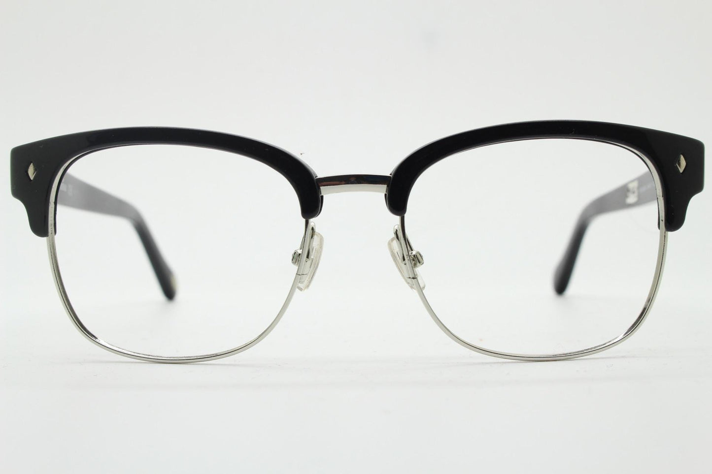 Fossil brow line eye glasses. Sharp and clean clubmaster format. Silver optical frames with black browline. Prescription eyeglasses. RX