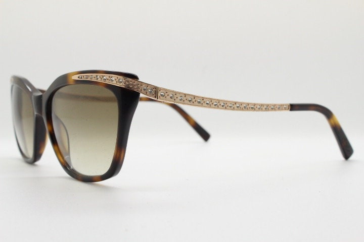 Borsalino cat eye sunglasses made in Italy model 250. Womens Tortoise acetate frame with dramatic diamante golden arms. Rhinestone cateye