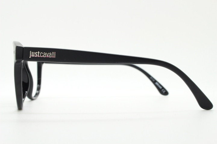 Just Cavalli vintage round eye glasses. Black gloss acetate optical frames with keyhole bridge. Prescription RX spectacles
