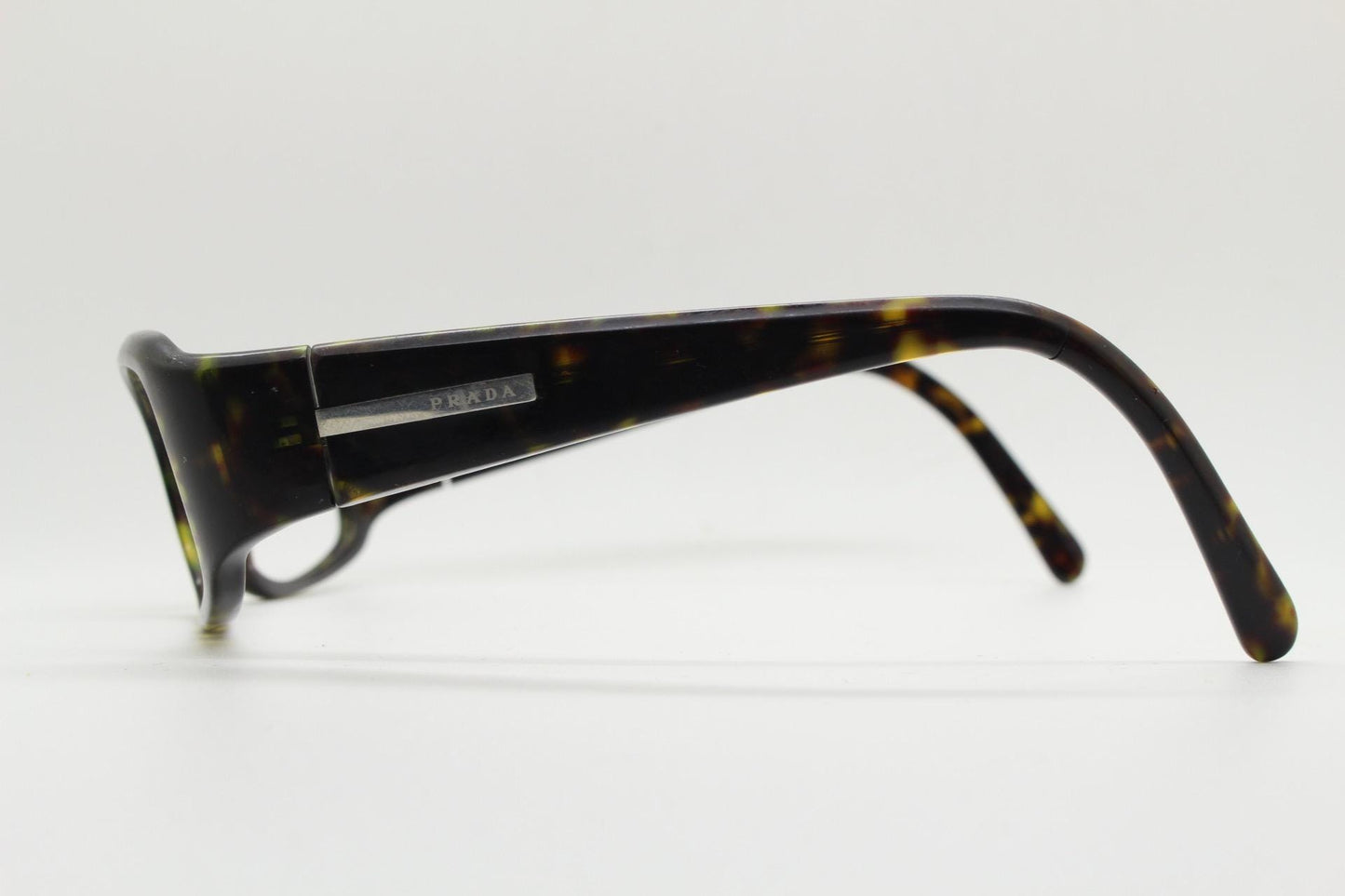 Prada rectangular wrap around eyeglasses made in Italy. Tortoise curving acetate optical frame with tall arms. Vintage prescription glasses