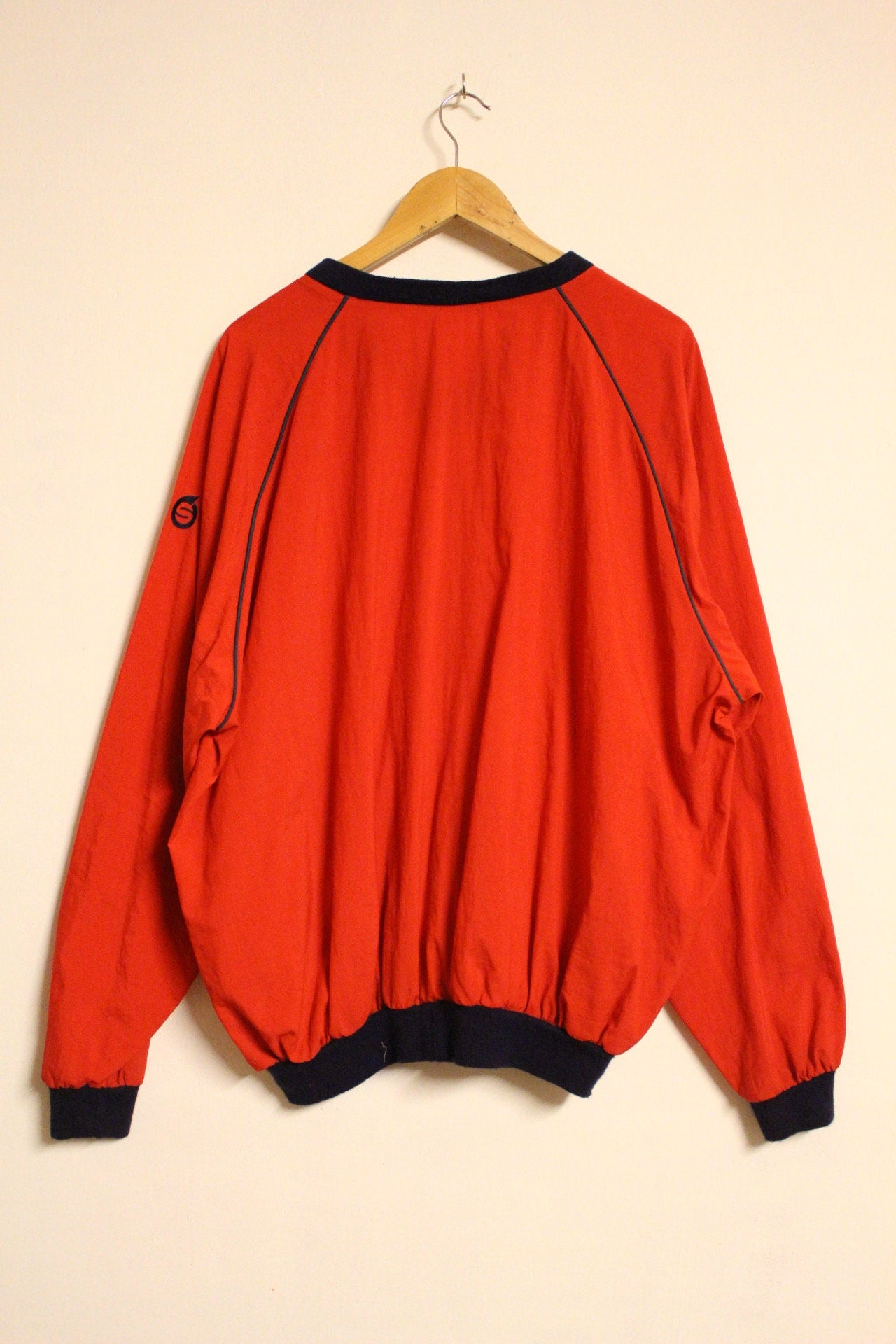 Vintage 80s oversized v neck pullover. Made in England. Bright red baggy football style unisex top. Club kids jumper. Rave