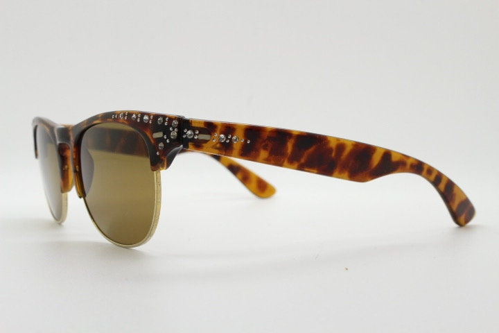 80s vintage browline diamante sunglasses. All time classic design in tortoise gloss with gold half rim and rhinestones. 50s rockabilly