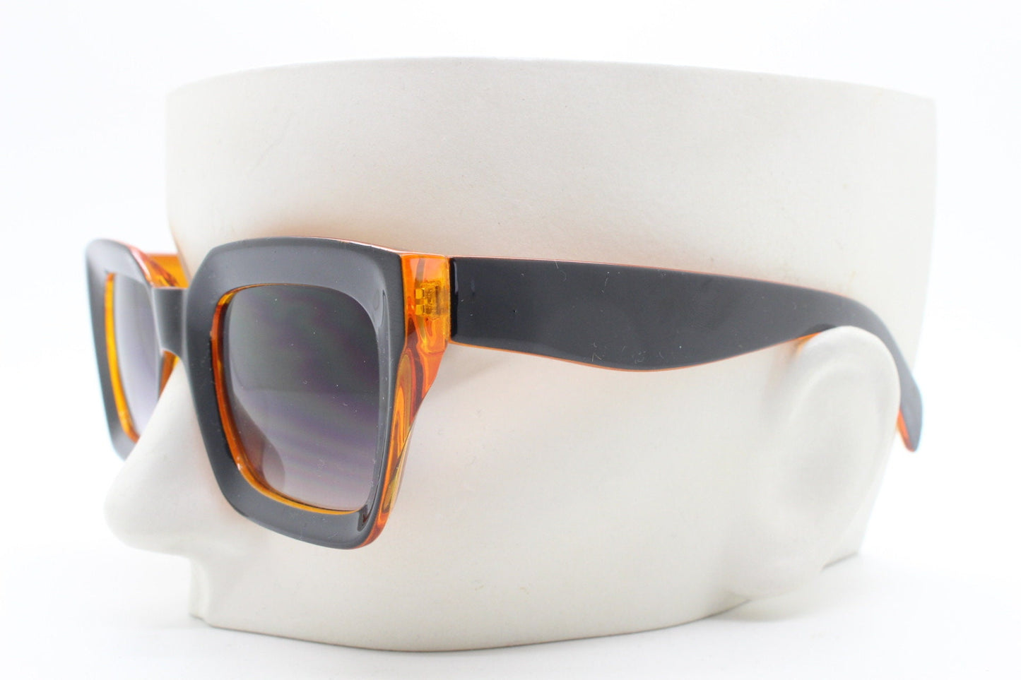 Y2K vintage rectangular cat eye sunglasses. Women's thick black and orange 60s style frame with graduating smoky lenses. 2000s BNWT