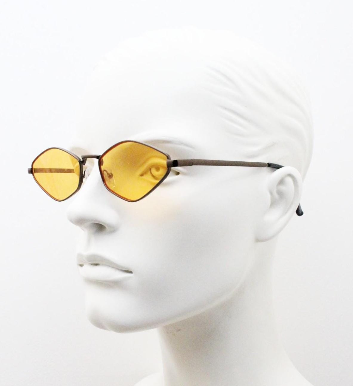 90s vintage pointed hexagon sunglasses. Minimal bronze brown psychedelic mod style frame with blazing orange lenses. Unused NOS