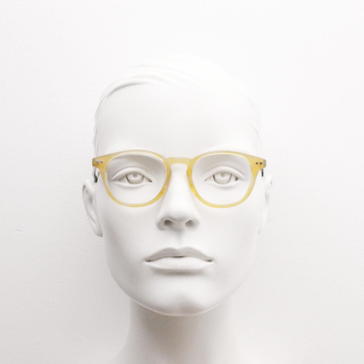 Entrostyle vintage round 40s design eye glasses. Beeswax coloured acetate optical frame with keyhole bridge and black arms. Prescription RX