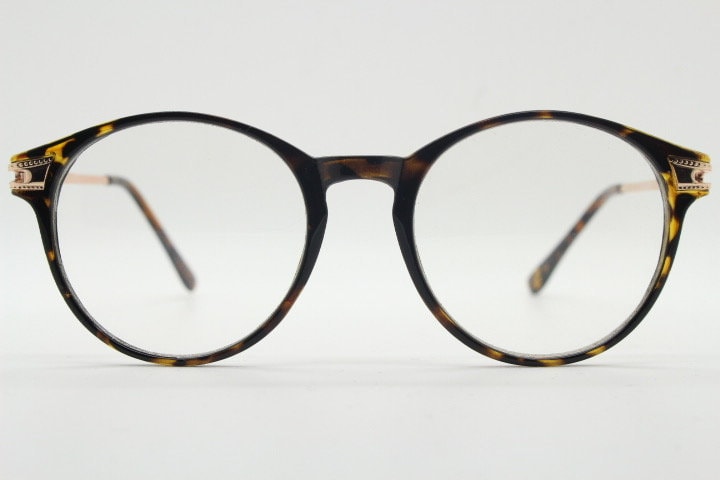 90s vintage round glasses with tortoise front and gold embossed arms. 40s, 50s style prescription optical frames. Clear lens eyeglasses. RX