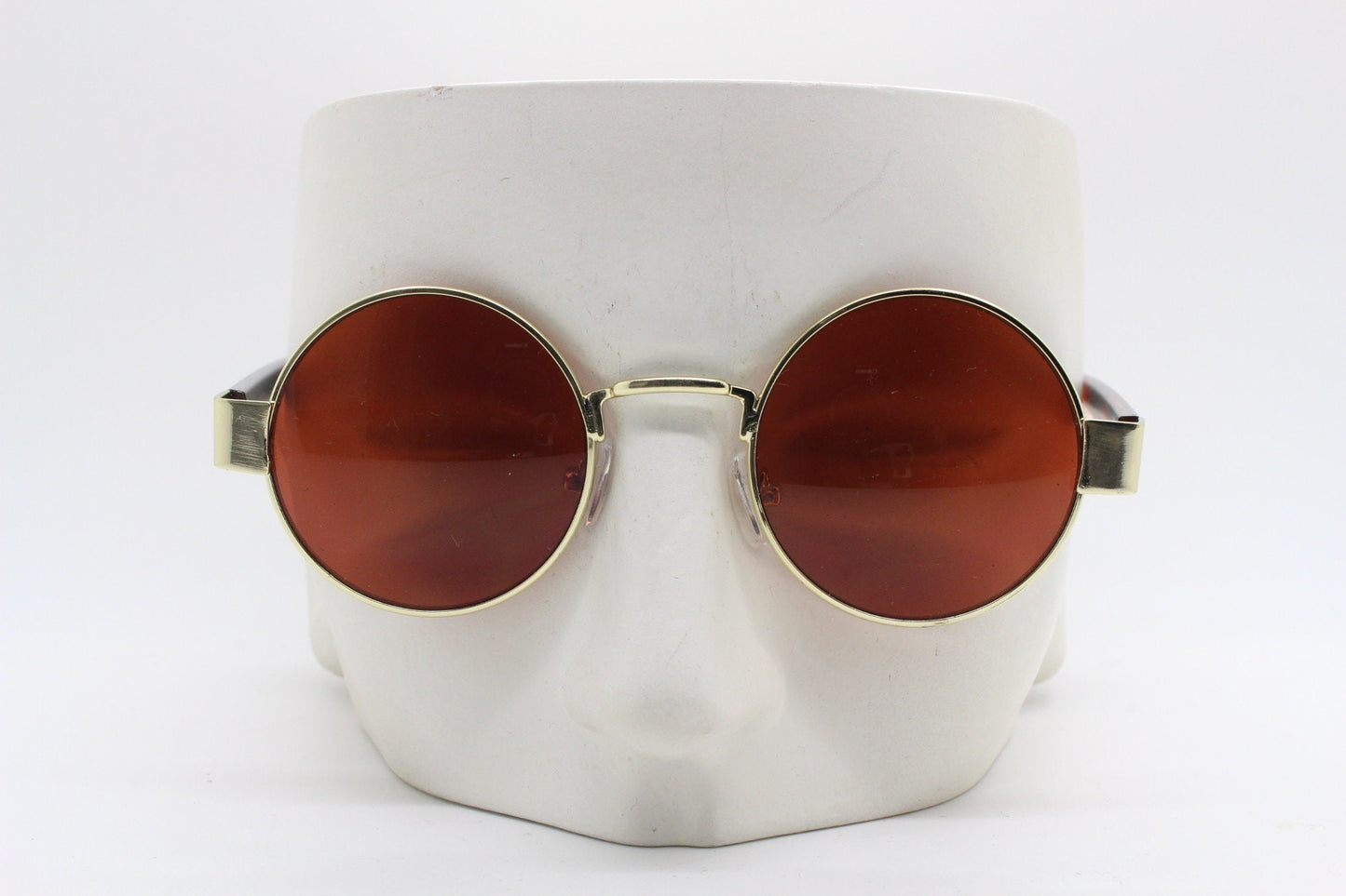 90s round vintage sunglasses. Gold 1920's style frame with tiger pattern arms and brown lenses. Unused. BNWT