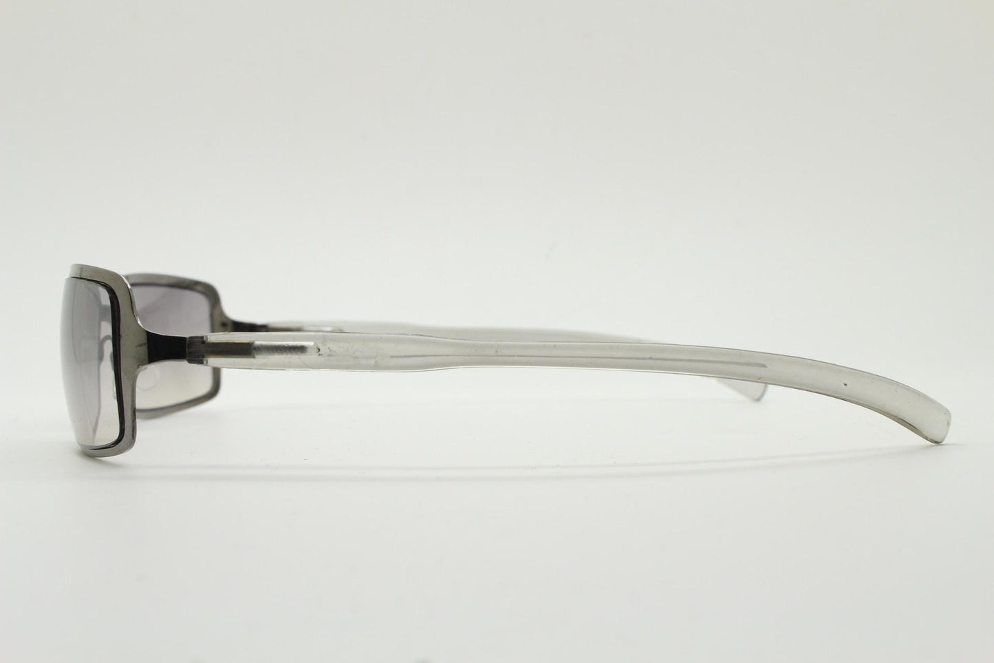 Y2K vintage rectangular sunglasses. Low profile mini shield frame in gunmetal chrome with light tone graduated mirror lens. 2000's. 90s. NOS