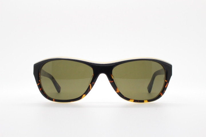 Linda Farrow Luxe sunglasses made in Japan. Blended black and tortoise layered acetate. Gallery Projects Vintage. NOS