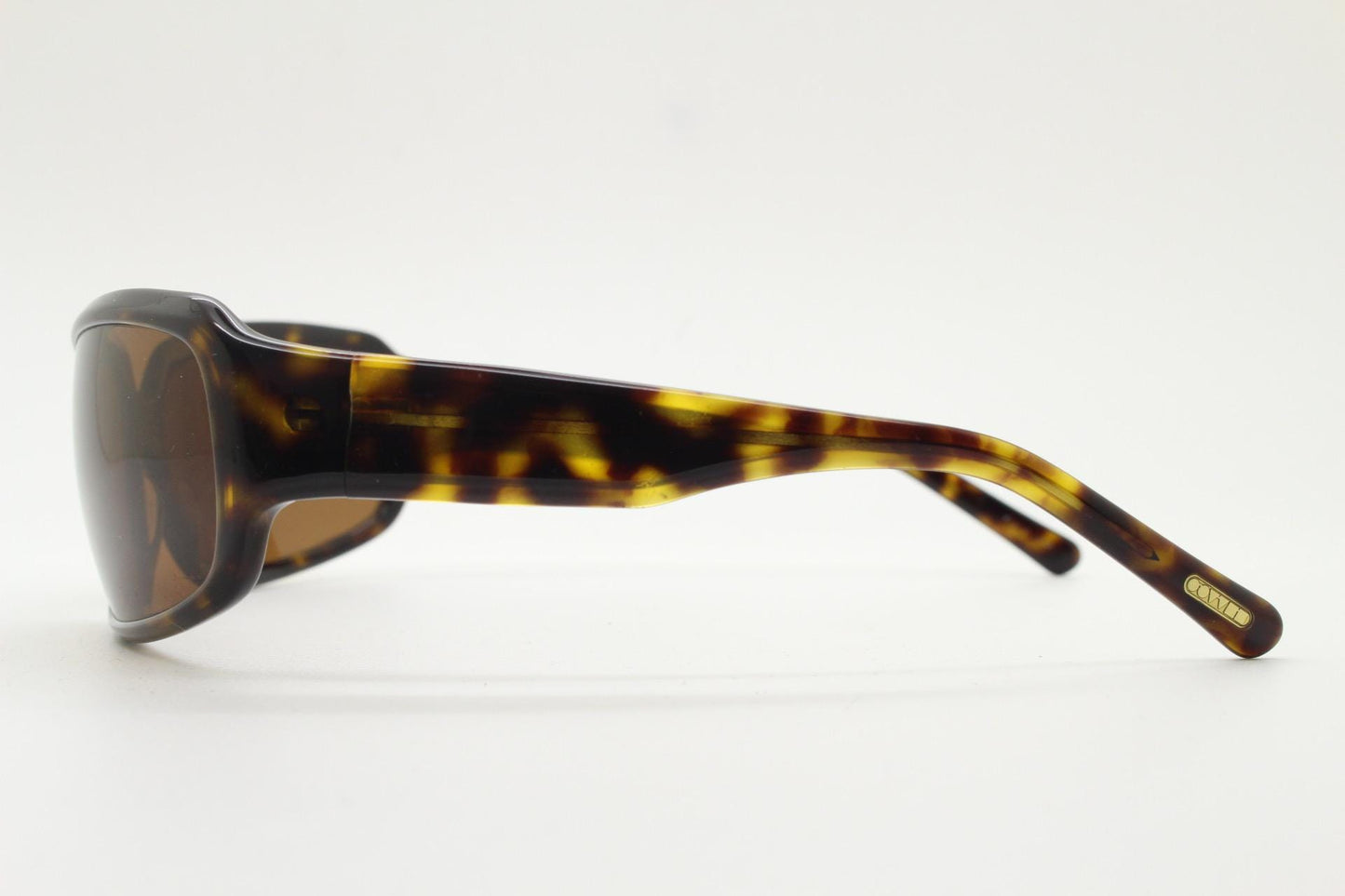 Oliver Peoples vintage Y2K wrap around sunglasses model Impala made in Japan. Curved bug eye in mottled brown tortoise acetate