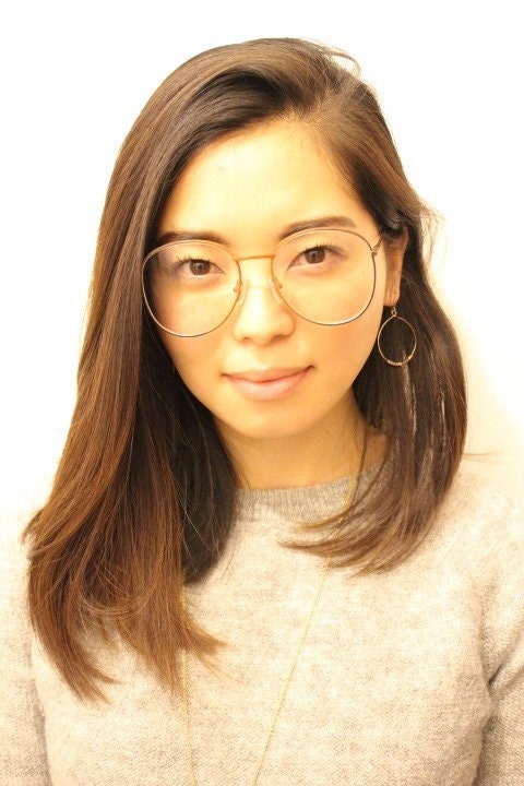 80s vintage modified aviator eye glasses by Conquistador. Slightly oversized orange and brown metal optical frame. Prescription Rx. 70s