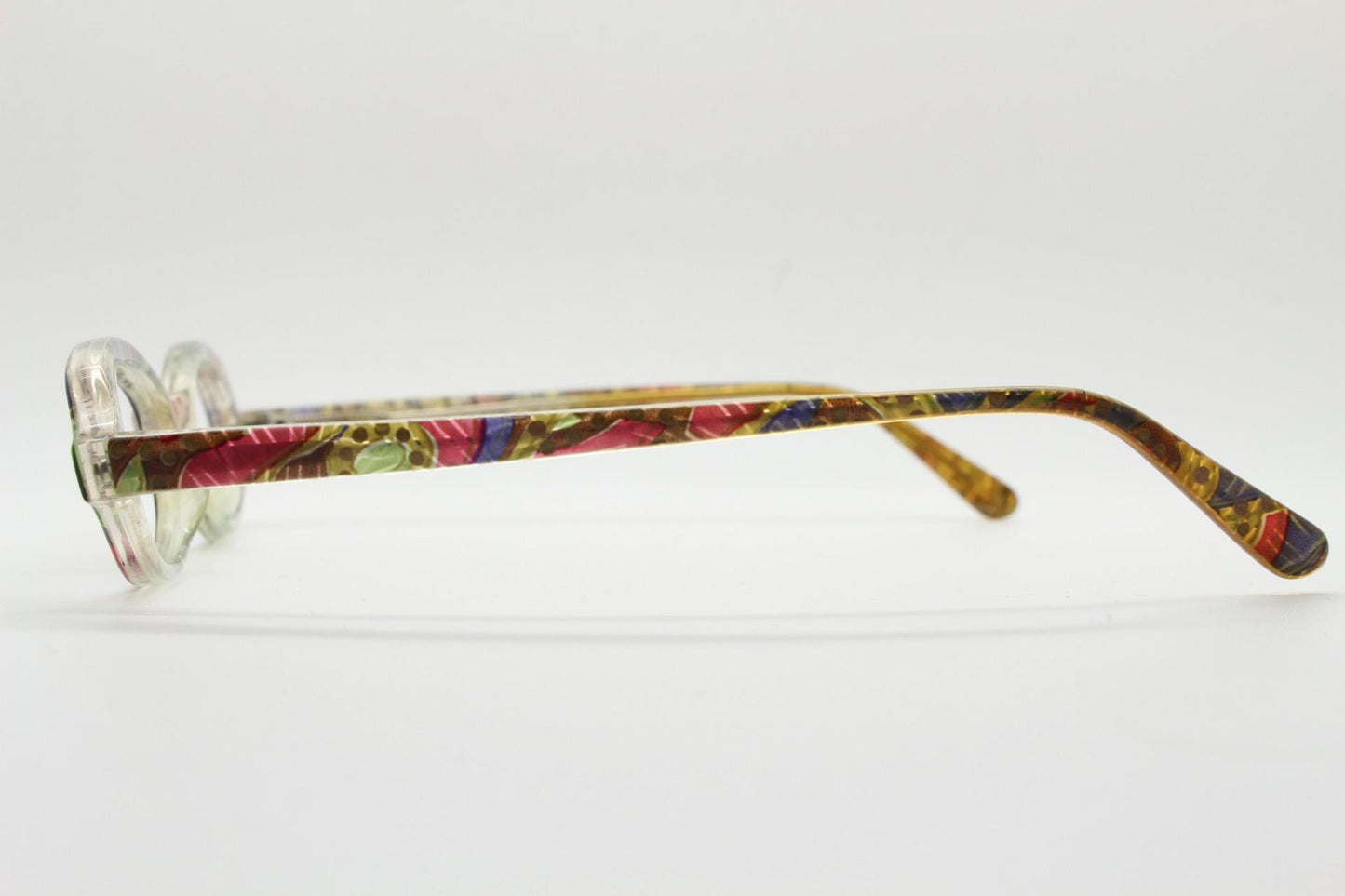 90s vintage small oval eye glasses. Low profile acetate optical frame with extraordinary abstract multi coloured pattern. Prescription RX