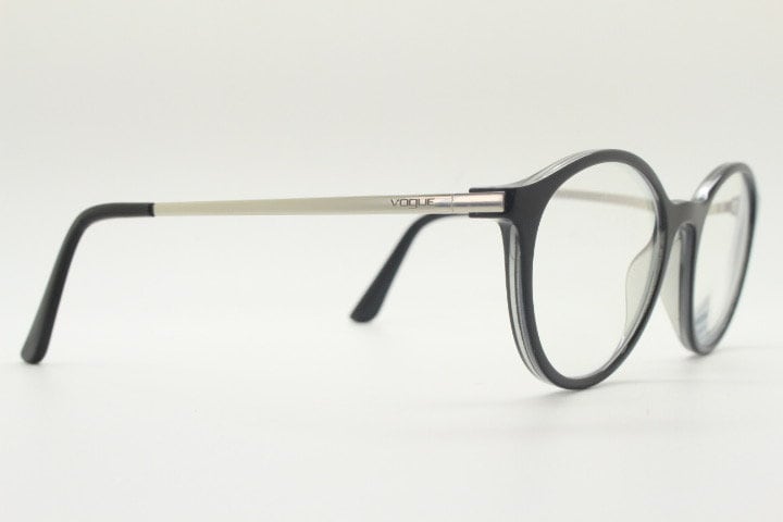 Vogue womens oval eye glasses model 5223. Black acetate optical frames with metal arms. Prescription eyeglasses. RX spectacles