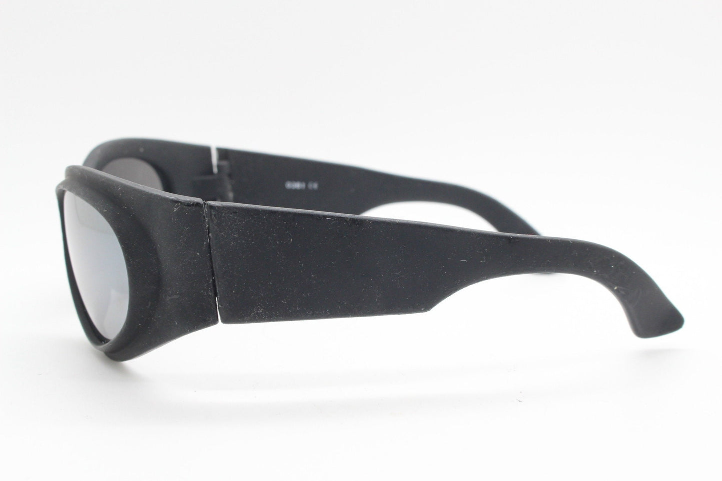 90s vintage futuristic super hero bug eye goggle sunglasses. Black rubber wrap around sporty shield frame with mirror lens. 2000s. Y2K. NOS