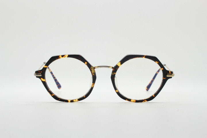 Kaleos hexagon eye glasses model Trevethyn made in Italy. Amber tortoise acetate optical frames with gold arms. Prescription eyeglasses. RX