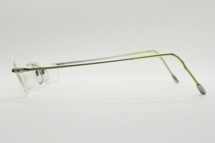 Silhouette rectangular frameless eye glasses made in Austria. Minimal lightweight optical frame with silver trim. Prescription RX