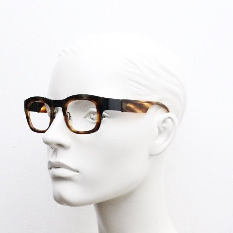 Anne et Valentin rectangular eye glasses hand made in France. Black matt titanium optical frame with mottled brown acetate. Prescription RX