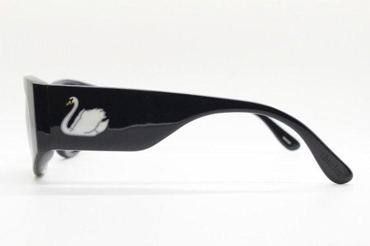 Charles Anastase for Linda Farrow Gallery sunglasses. Womens black gloss acetate  thick frame design with tall arms and swans. NOS vintage