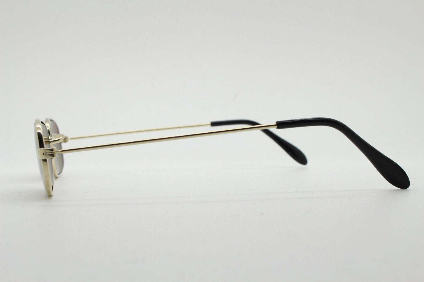 80s vintage rectangular low profile metal sunglasses. Minimal 60s mens mod design in gold chrome frame with brown lenses. NOS