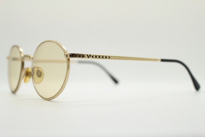 Vogue women's round eye glasses made in Italy. Gold chrome panto optical frame with indented diamond patterns. Prescription RX spectacles