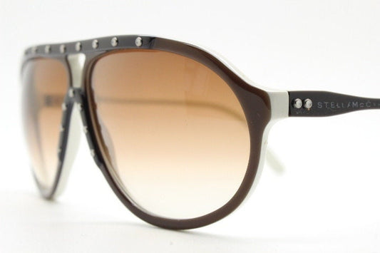 Stella Mc Cartney vintage aviator sunglasses. Small brown and white acetate aviators with graduating lens and white studs. Pilot. Teardrop