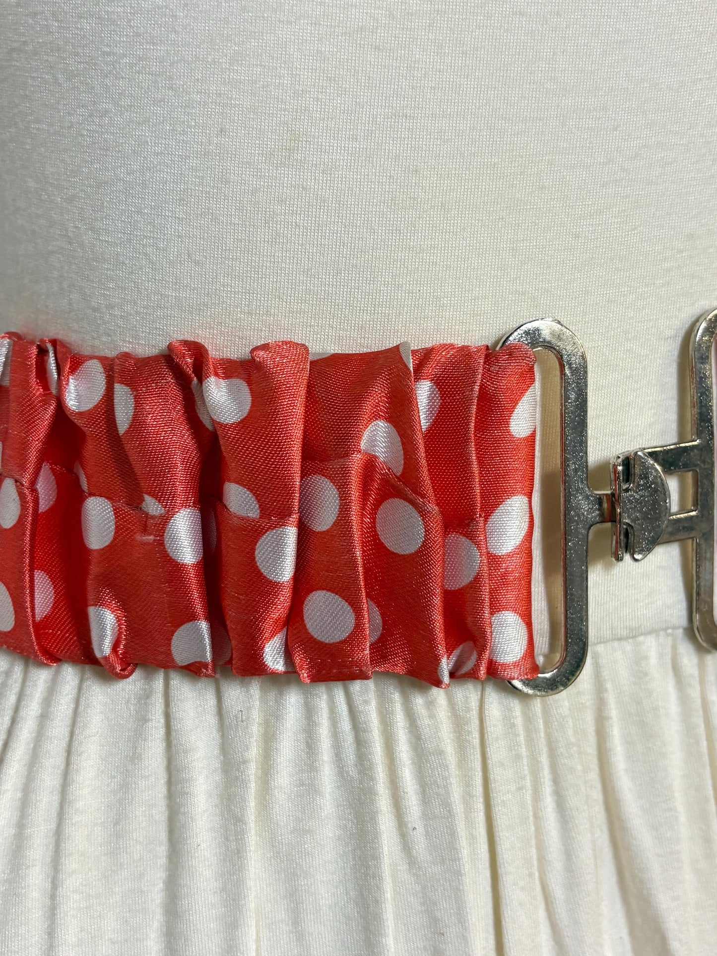 80s vintage womens elastic red with big white polka dots stretch belt. Flattering cinch for a dress. Chrome buckle. Minnie mouse cosplay