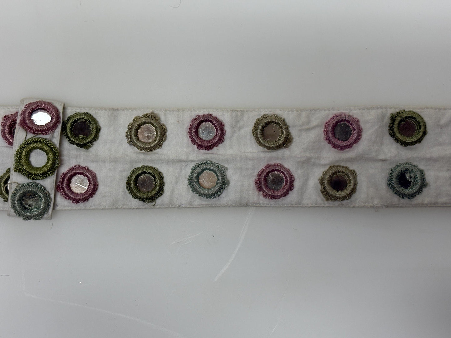 Y2K vintage womens dress belt by Stephanie Hirsch. White with pink and green embroidered little frames around mirror circles. 2000s. BNWT